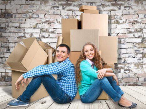 Local packing team handling furniture and boxes during a New Malden move