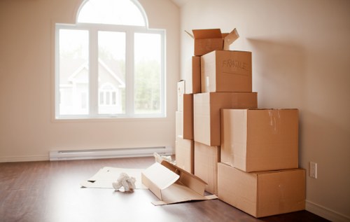 Local packing service preparing fragile items for transport