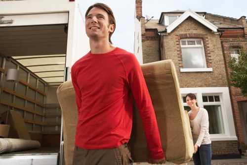 Local removals team managing a move in New Malden