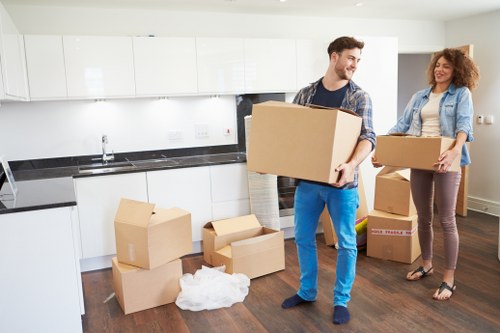 Commercial office furniture and equipment being prepared for a local move