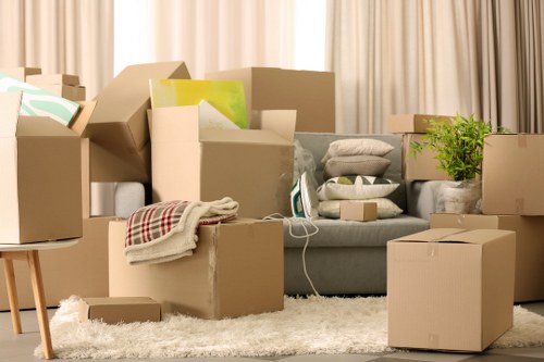 Packed business equipment ready for a commercial move in New Malden