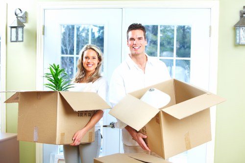 Checklist and packing boxes prepared for a commercial move in New Malden