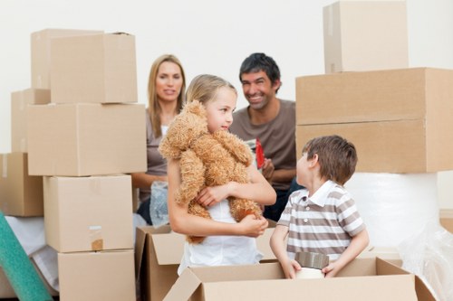 Packed household boxes and furniture ready for transport